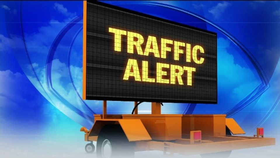 Traffic light at 1st and Clay in flashing red mode, pending repairs to controller