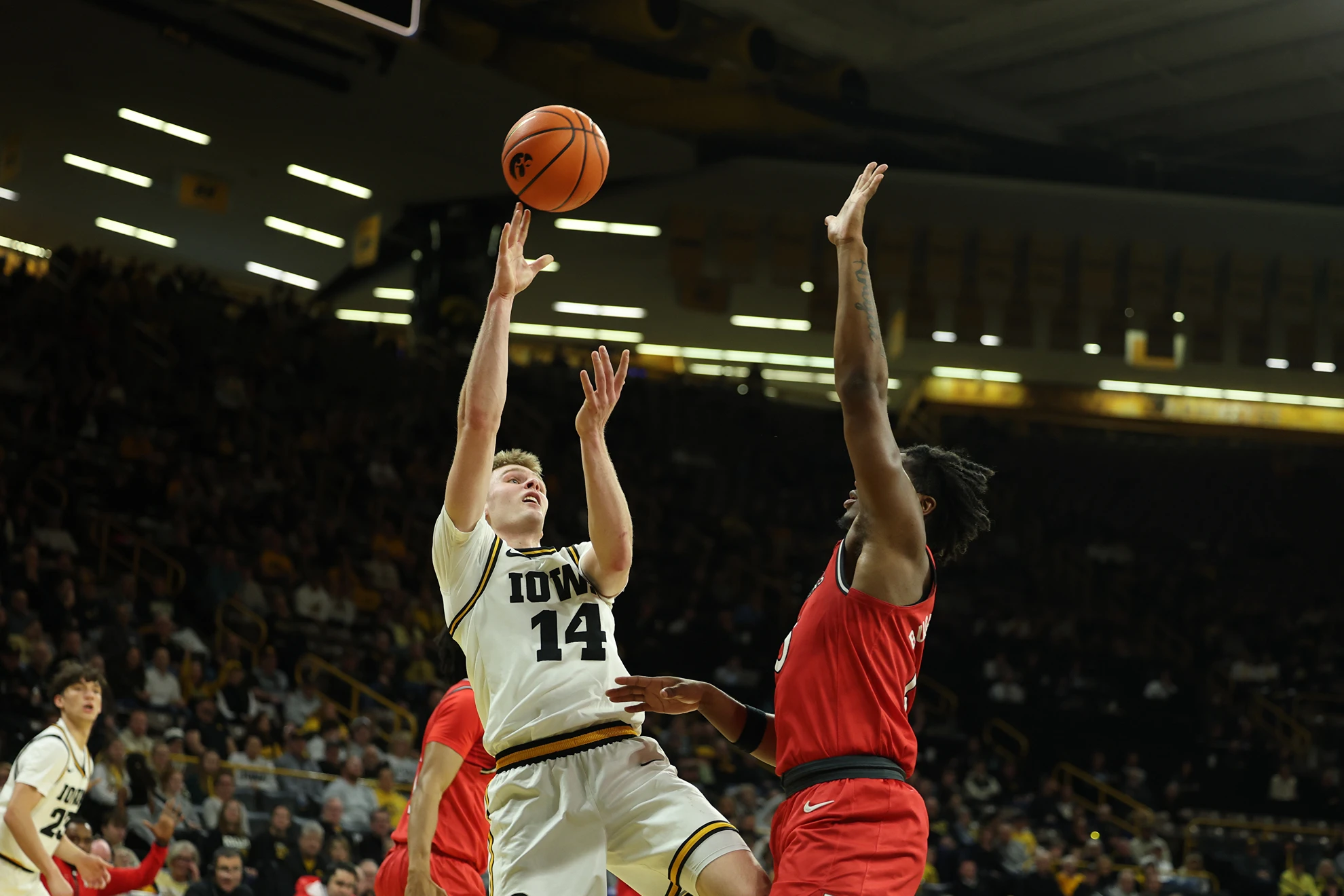 Iowa Upends Rutgers 68-62